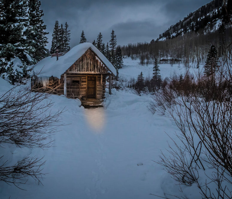Dolores Cabin on Colorado mountain landscape after snow