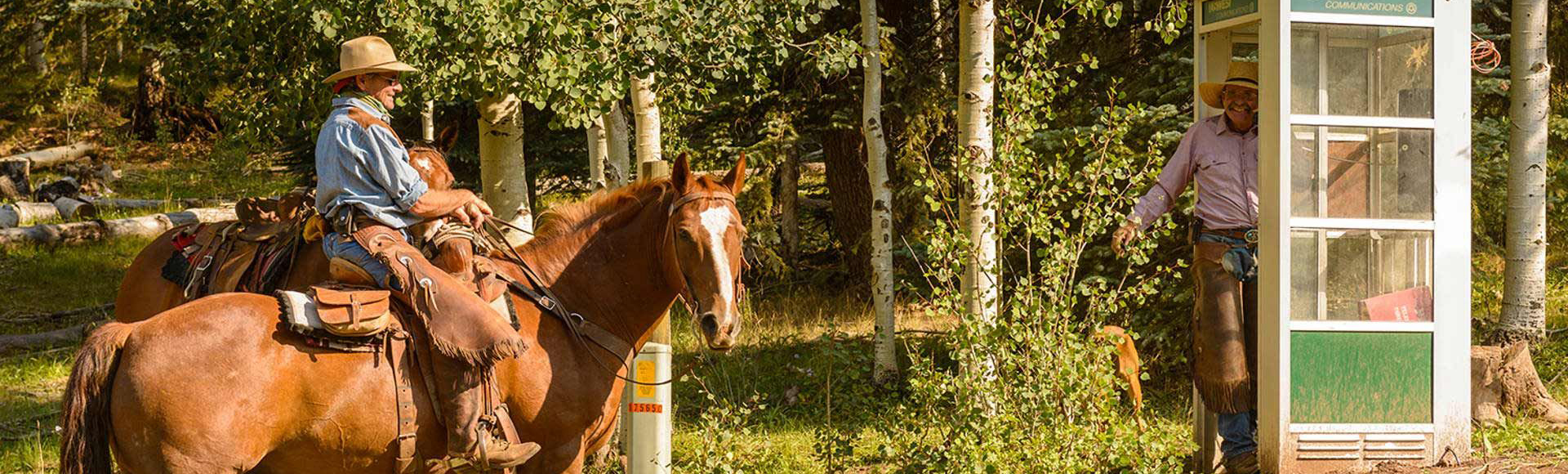 Cowboys with phone booth
